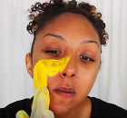 She-Begins-Rubbing-Turmeric-Onto-Her-Cheeks