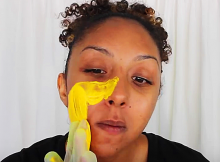 She-Begins-Rubbing-Turmeric-Onto-Her-Cheeks